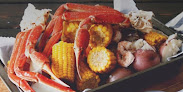 Reel ‘Em In Fresh Seafood and Gourmet of Seacrest located in Peddler's Pavilion on 30A - Seafood restaurant in Seacrest