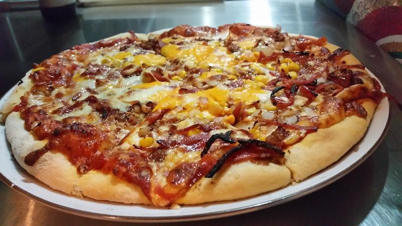 Km de pizza - Restaurant in Calle