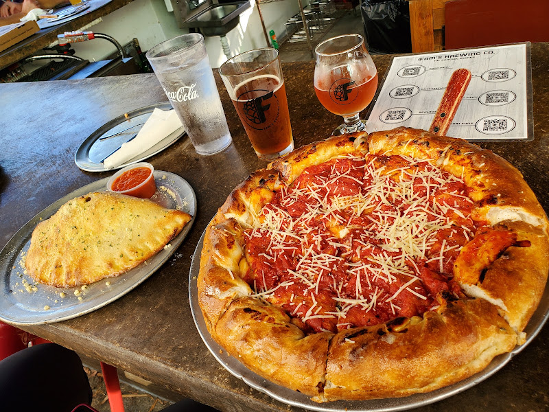Fam's Brewing Co. featuring Famulari's Pizzeria - Brewery in Charleston